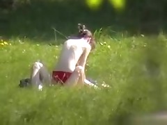 A creeper in the bushes catches a undressed couple fucking in the park with his cam. Their undressed bodies receive it on and enjoy their sex out of a care in the world or the slightest suspicion that someone may be lurking.